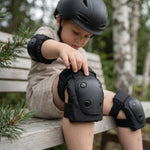 CHANTY Casco infantil + Set de protección – Negro